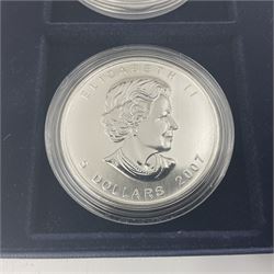 Four one ounce fine silver coins, forming 'The 2007 Famous World Silver Coin Collection', comprising United States eagle, Australian kookaburra, Chinese panda and Canadian maple leaf, cased with Westminster certificate 