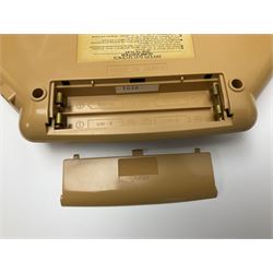 Three late 70s/early 80s handheld electronic games; Bandai Electronics Arcade ‘Gunfighter’ (1980), Grandstand ‘Invader From Space’ (1980), Palitoy ‘Merlin The Electronic Game Machine’ (1979) with game sheet and instruction booklet, all with original boxes (3) 