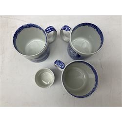 Three Spode mugs in Italian pattern, together with two Leeds pottery shell dishes 