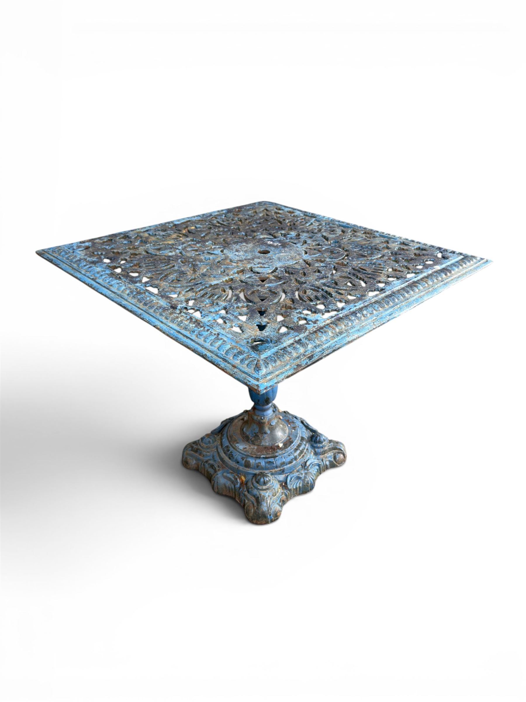 Victorian revival ornate cast iron garden table, pierced square top, pedestal base, finished in distressed blue paint