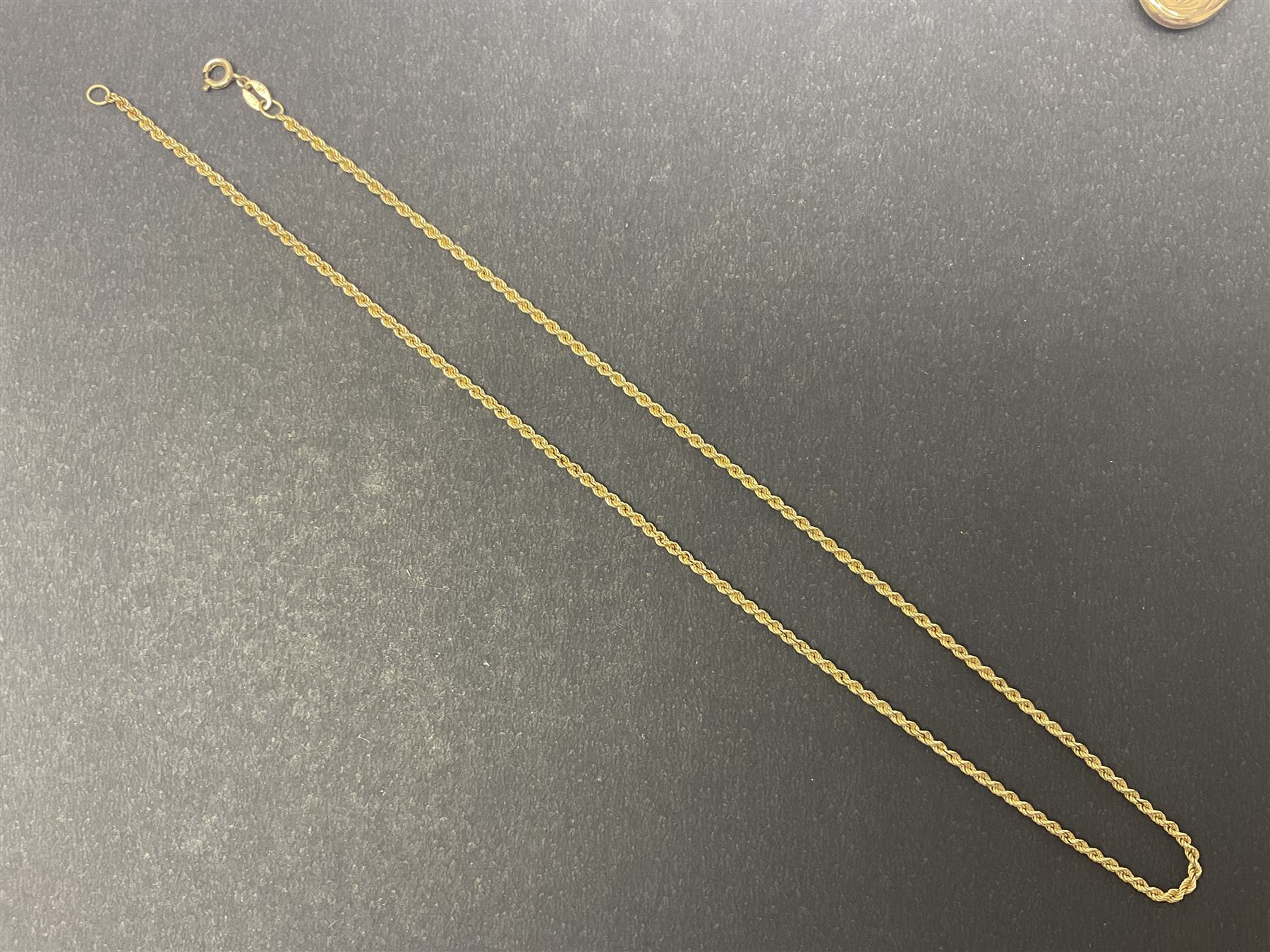 9ct gold jewellery, including opal ring and two other stone set rings, locket and rope twist chain 