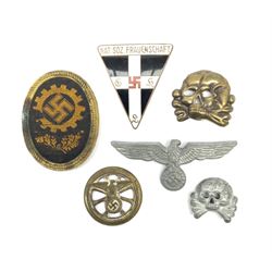 Six WW2 German badges - cap badge D.A.F. labour front; SS skull cap insignia First pattern 1925-35; Frauenschen Mother's Union; tank driver collar badge 1939-42; N.S.K.K. cycle corps; and officer's cap insignia 1940-42 (6)