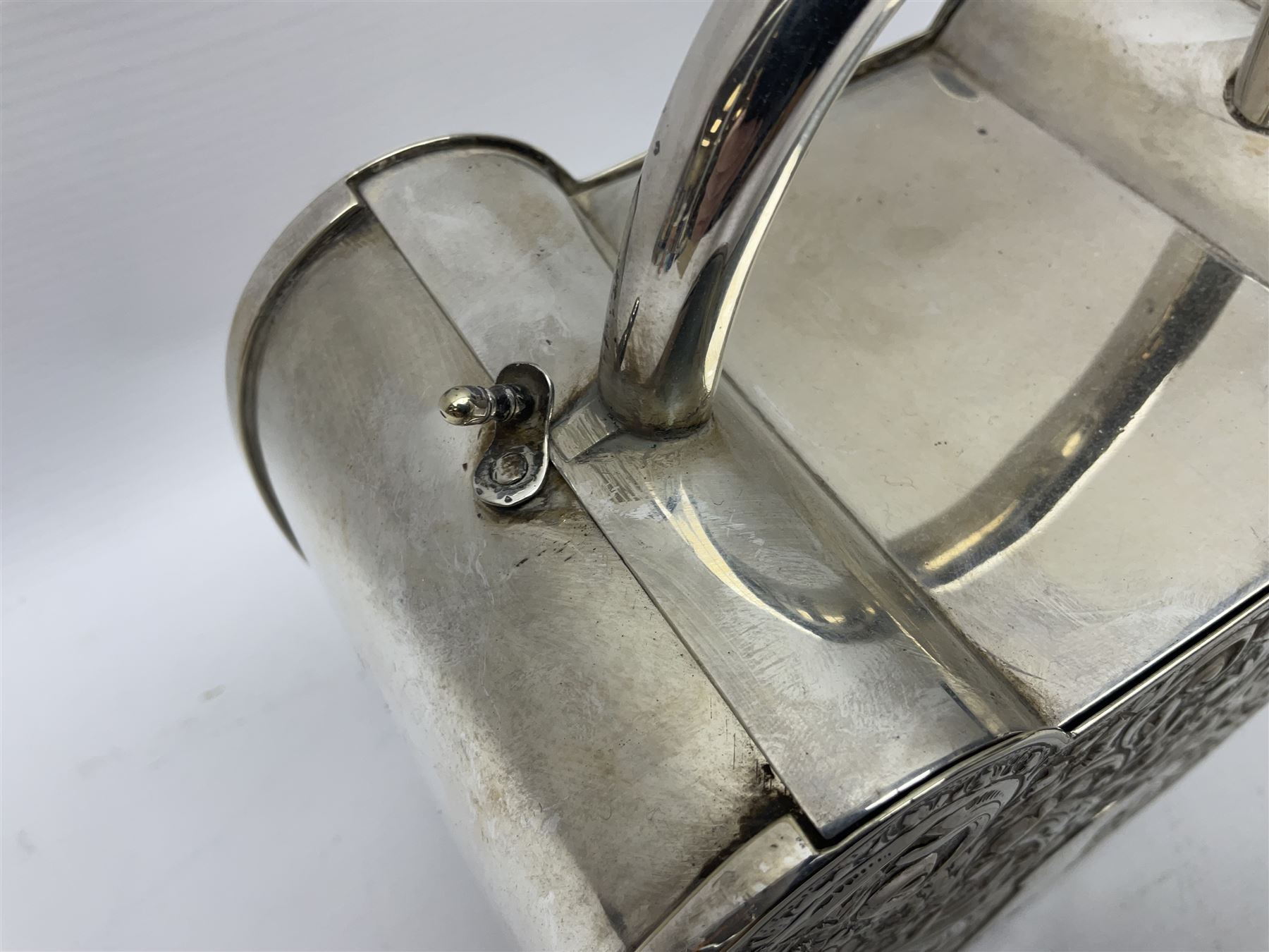 Silver plated, tea caddy, in the form of a heart, with repousse decoration, presented to H Whitcombe, H20cm