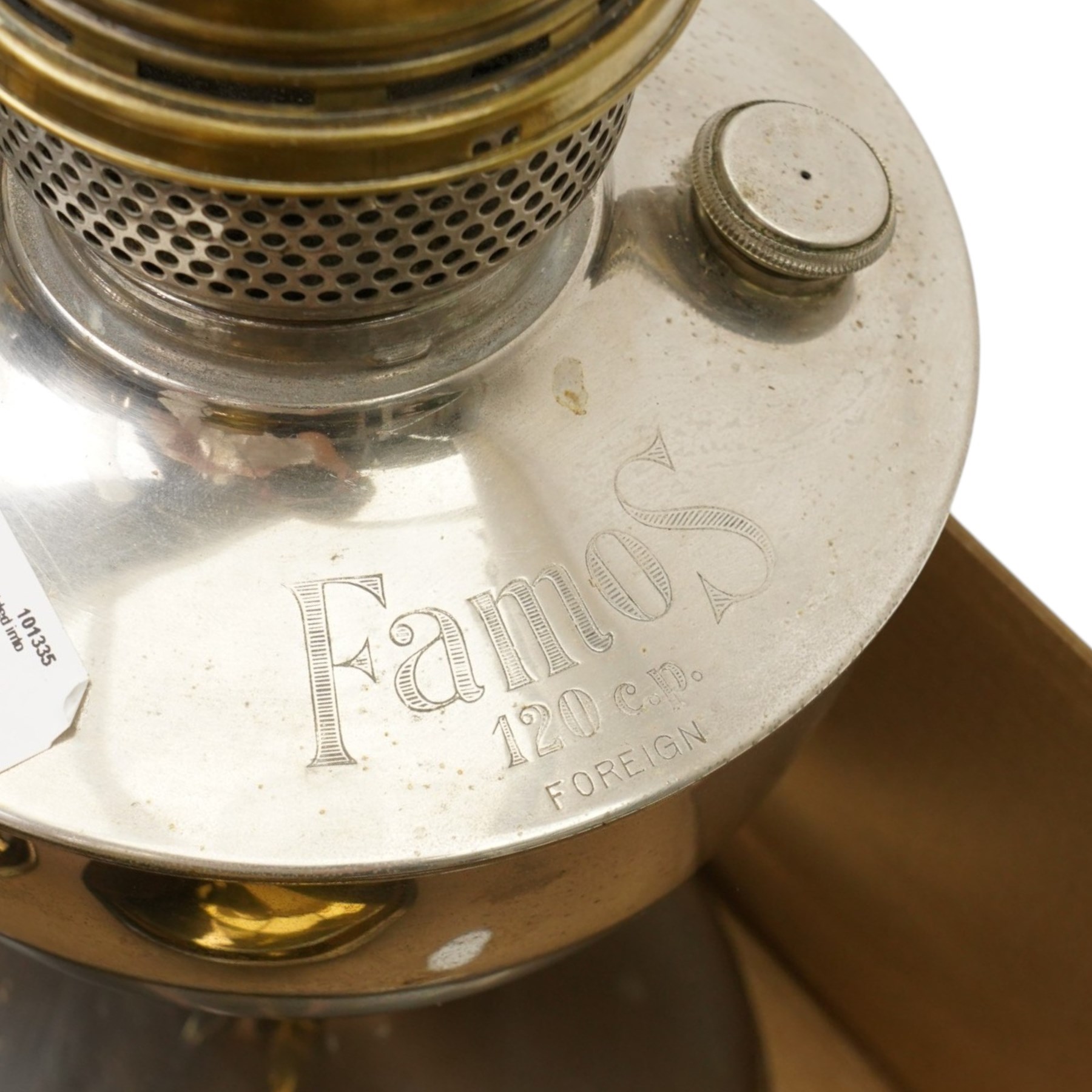 Brass table oil lamp of circular form, two Aladdin 23 lamps, Famos lamp and one other