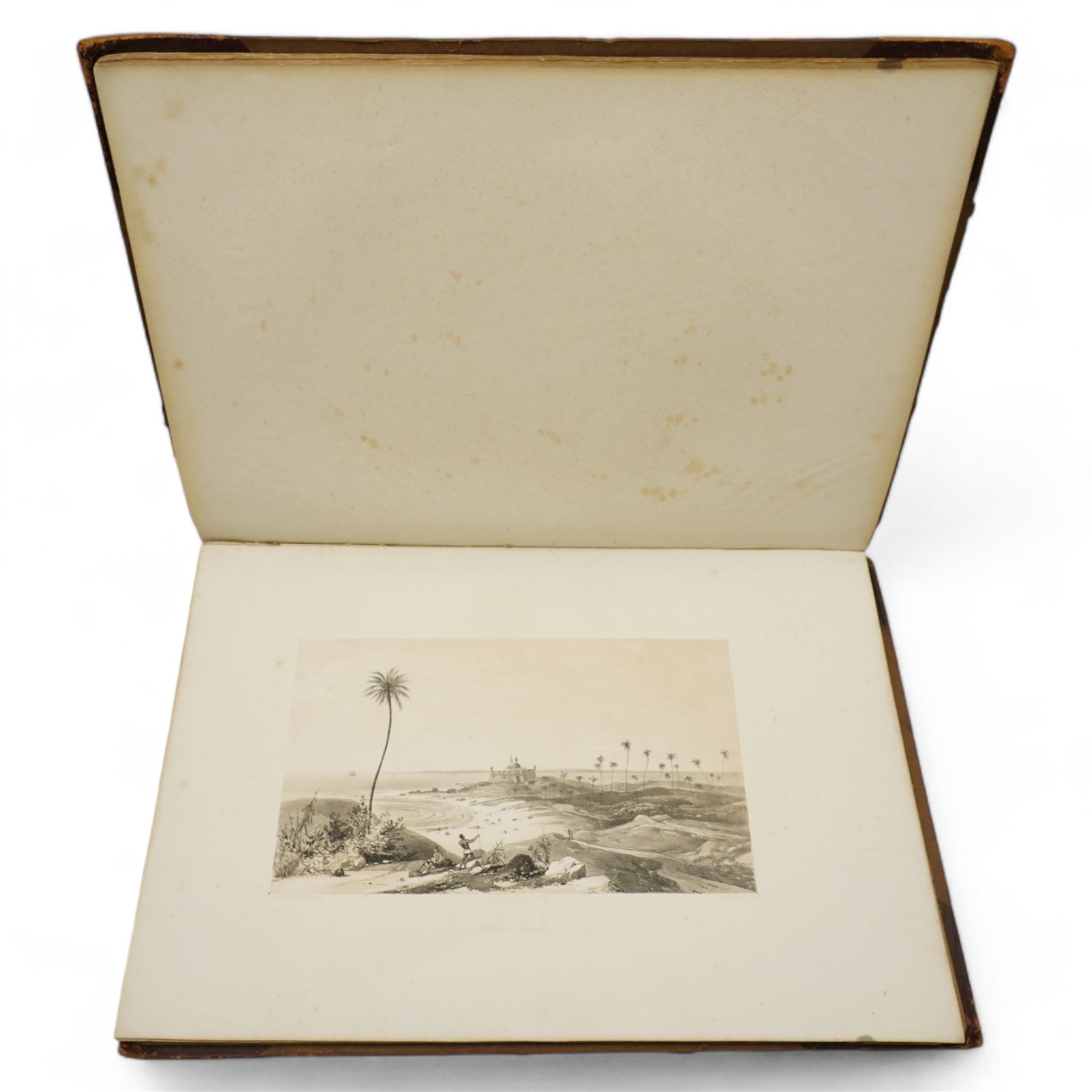 Sir William Gore Ouseley (British 1797-1866): 'Views in South America, from original drawings made in Brazil the River Plate, the Parana, &c', folio containing twenty six (26) tinted lithograph plates with lithographed titled and plan, dedication to Prince Albert with list of plates on verso, pub. London: Thomas McLean 1852, bound in oxblood leather and brown cloth
