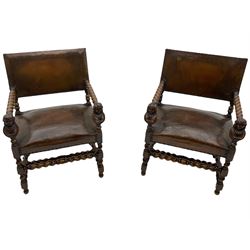Pair late 19th century oak barley twist framed open armchairs, leather upholstered seats and backs with studded detail, carved Flemish style half bust arm supports and terminals 