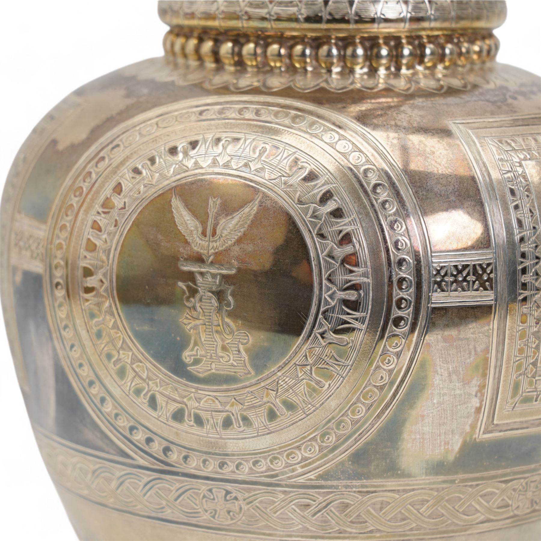 Victorian silver claret jug of baluster form engraved with Greek dithyramb panels in honour of  Dionysus, the spout with the mask of Pan, the scroll handle with birds foot terminal and with further engraved guilloche and other decoration H36cm Sheffield 1864 Maker Roberts & Belk. This item has been registered for sale under Section 10 of the APHA Ivory Act