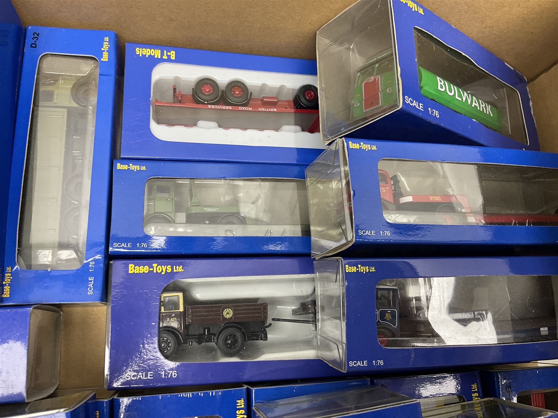 Fifty-seven Base Toys 1:76 scale die-cast models, all boxed (57)