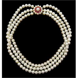 Three row cultured pearl choker necklace, with 9ct gold pearl and ruby clasp, London 1985