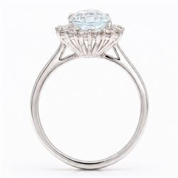 18ct white gold aquamarine and diamond cluster ring, single oval cut aquamarine of approx 1.95 carat, surrounded by fourteen round brilliant cut diamonds, London 2022, total diamond weight approx 0.50 carat