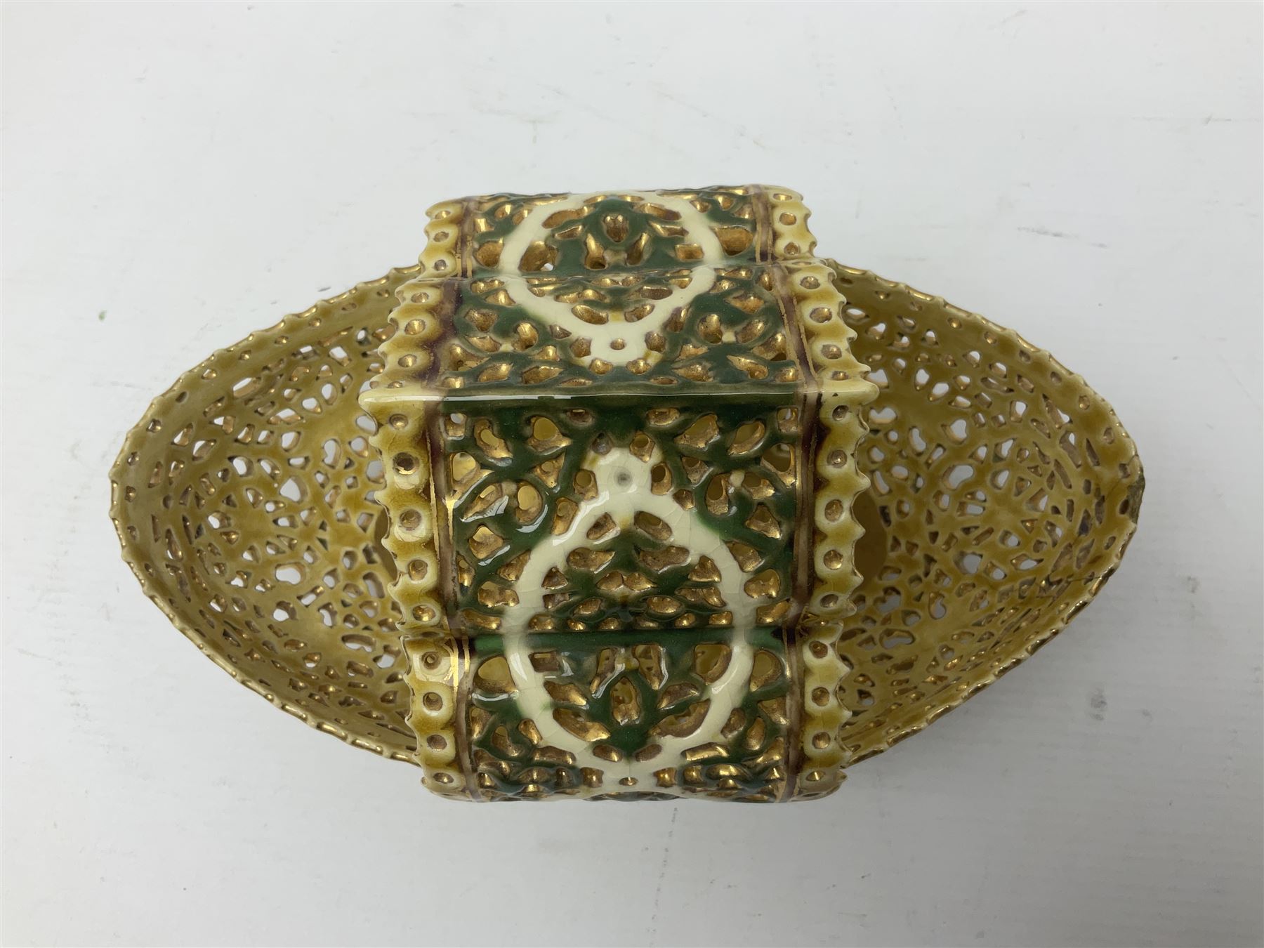 Hungarian Zsolnay Pecs gilt and green reticulated basket, upon four feet, with gold mark beneath, H14cm L21cm