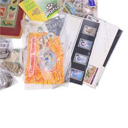 Great British and World coins and stamps, including commemorative two pound and fifty pences, commemorative crowns, loose stamps, etc, in one box
