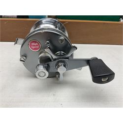 Four Abu fishing reels, comprising Ambassadeur 9000, Ambassadeur 7000, Ambassadeur 5500 and Ambassadeur 6500, together with additional line, hardy fishing bag and two wooden boxes