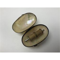 19th century lacquer thimble case with painted portrait of a woman to the hinged lid, together with two mother of pearl egg shaped thimble cases and one other