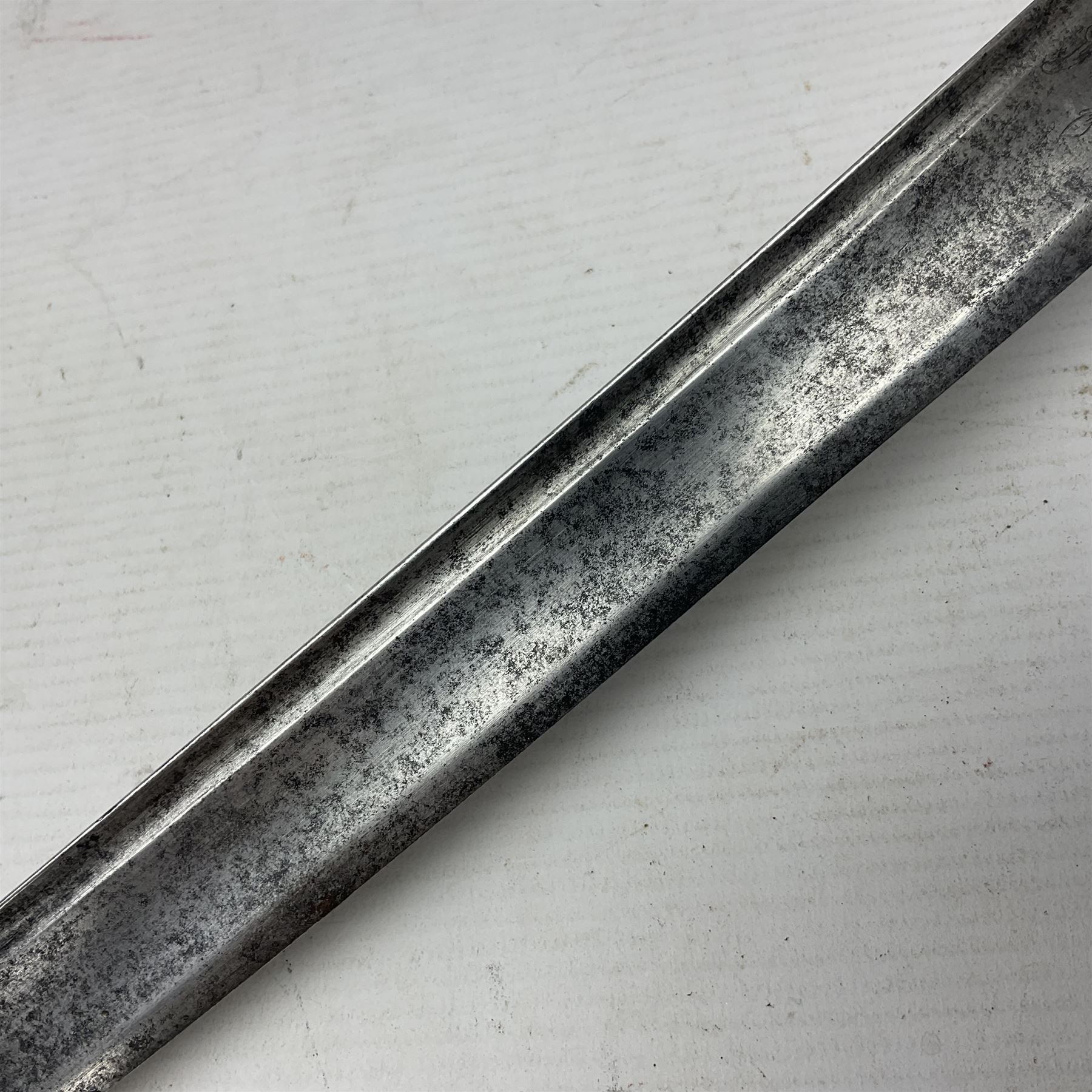 Late 18th century sword, the Spanish 79.5cm curving fullered blade engraved with the Royal Cypher, battle trophies and 'Viva Espania' banner, French Sabre de Mineur brass three-bar hilt with ebonised reeded grip L93.5cm overall (no scabbard)