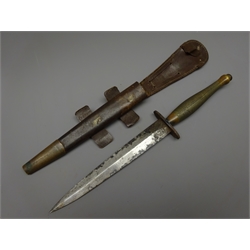  Fairbairn Sykes 2nd Pattern Fighting Knife, 17.5cm twin edged blade, etched 'Wilkinson Sword Co. London, The F-S Fighting Knife', steel cross guard and brass chequered grip, L30.5cm, leather scabbard   