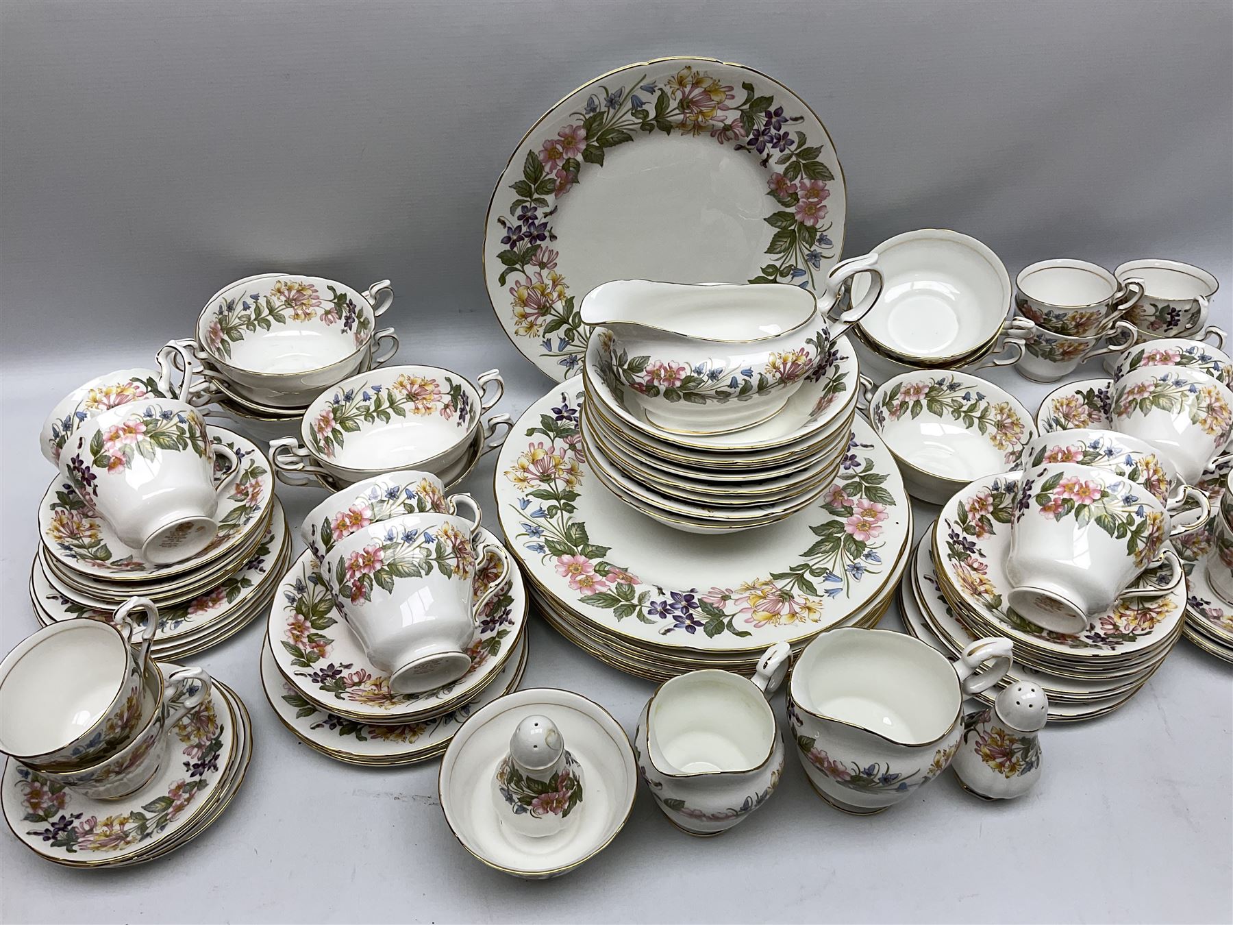 Paragon Country Lane part tea and dinner service, including eight tea cups and saucers, nine dinner plates, eight bowls, eight twin handled soup bowls, salt and pepper shakers etc (approx 80) 