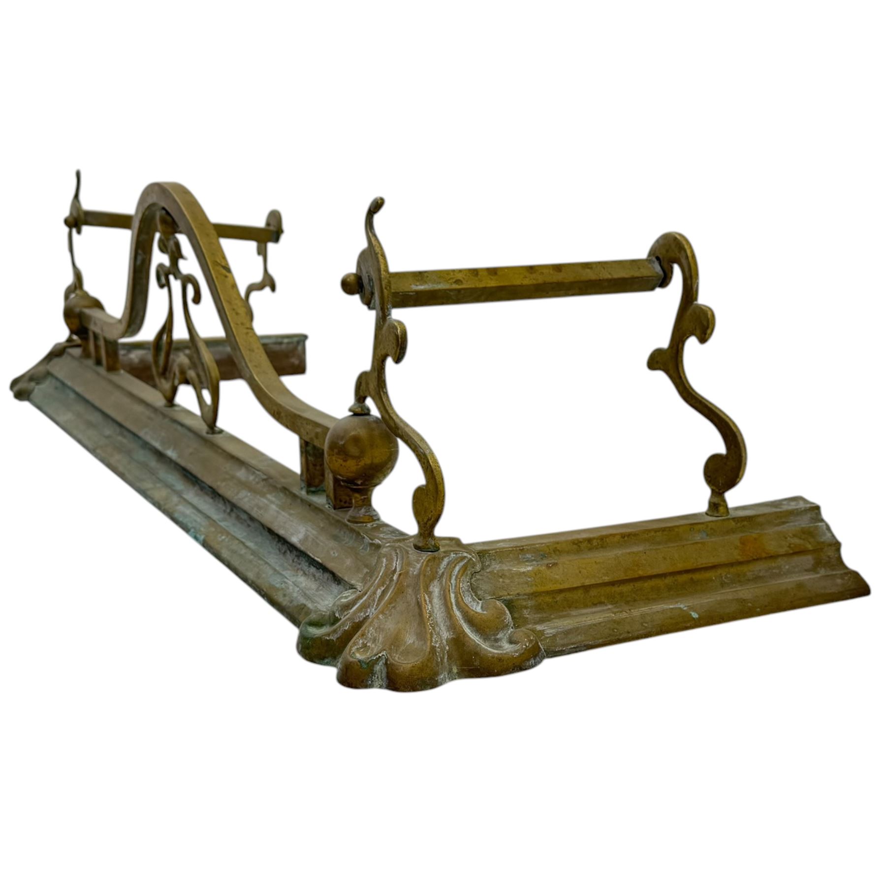 Three 20th century brass fenders, two with pierced Art & Crafts design rails, largest W156cm, D 45cm 