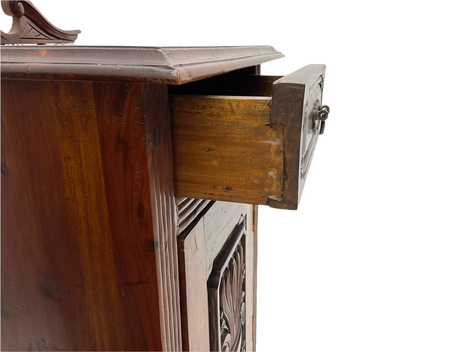 Pair Victorian style hardwood bedside cabinets, fitted with single drawer and cupboard, the doors carved with floral urns, on plinth bases