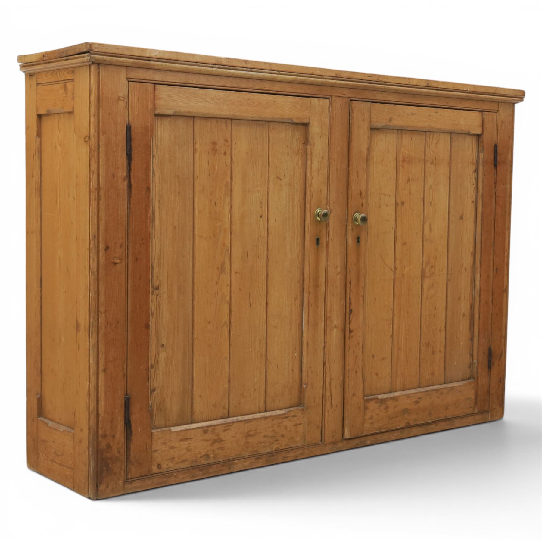 Victorian waxed pine low cupboard, fitted with two panelled doors and panelled sides, two interior shelves