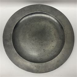 Group of seven 19th century pewter chargers, each of circular form with dished centre, two examples with touch marks verso, each approximately D39cm
