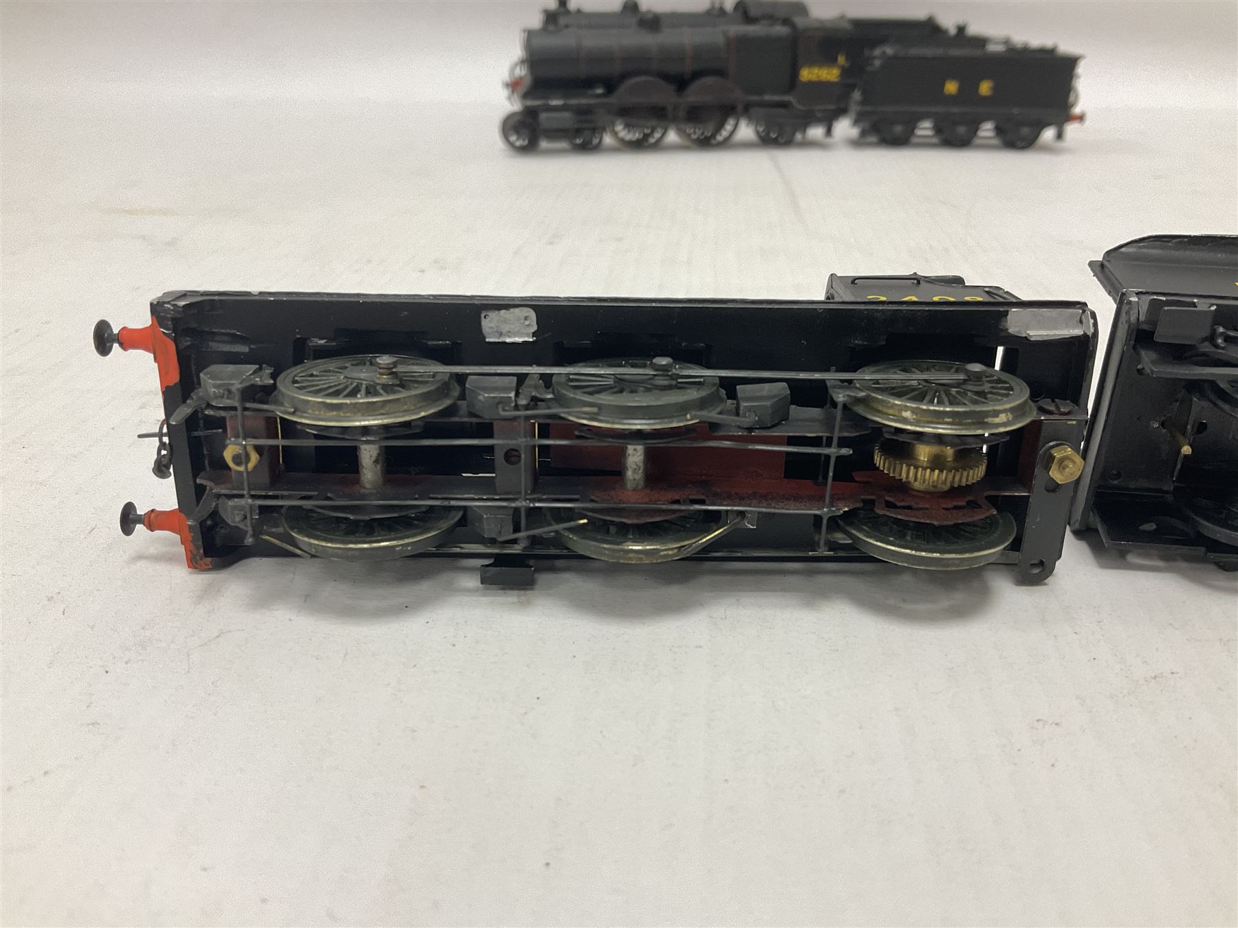 ‘00’ gauge - three kit built locomotive and tenders comprising Class D21 4-4-0 no.1242 finished in NER black with LNER tender; Class C4 4-4-2 no.5262 finished in LNER black; Coal Engines Class 0-6-0 no.2408 finished in black with Millholme Models LNER tender (3) 