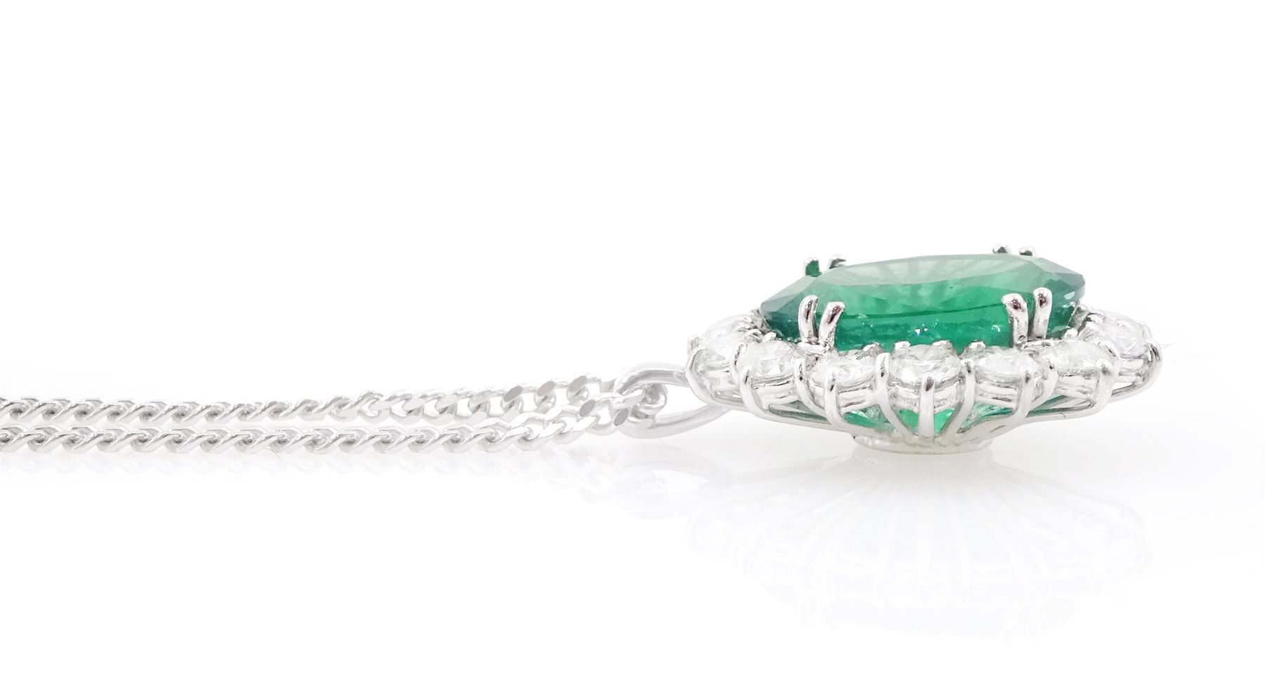 18ct white gold emerald and diamond cluster pendant necklace, single oval cut emerald of approx 4.00 carat, surrounded by fourteen round brilliant cut diamonds, hallmarked, total diamond weight approx 0.85 carat