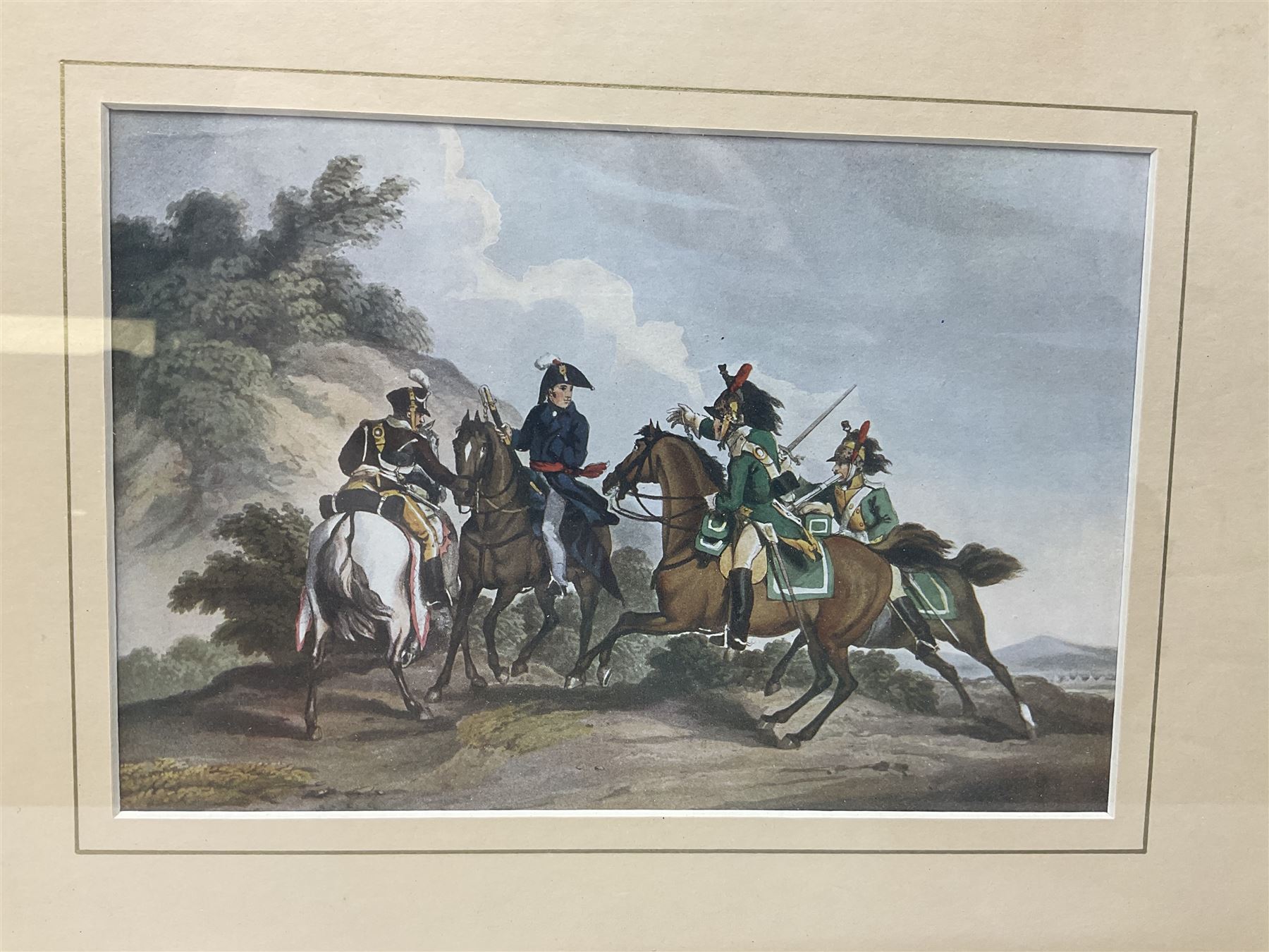 After Ackermann, Crimean War colour print in the Cobham Scenes series entitled '17th Light Dragoons (Lancers)', 15 x 19cm, Hogarth type frame; 19th century engraving of John Penn Private in the 17th Lancers, gilt frame; and oakframed colour print of a Napoleonic War scene (3)