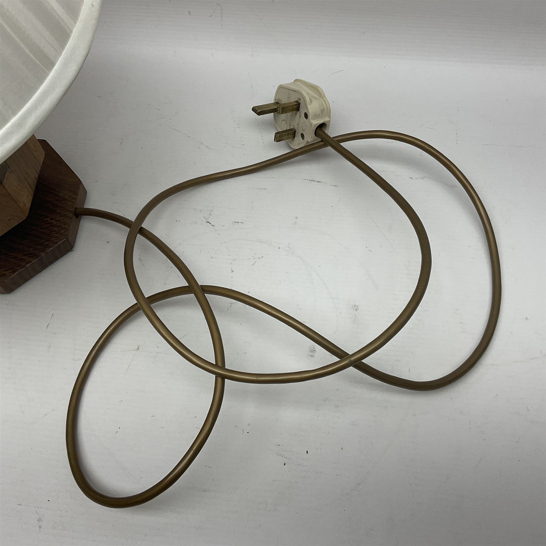 Acornman - oak table lamp, stepped and canted rectangular form on octagonal base, carved with acorn signature, by Alan Grainger, Brandsby, York