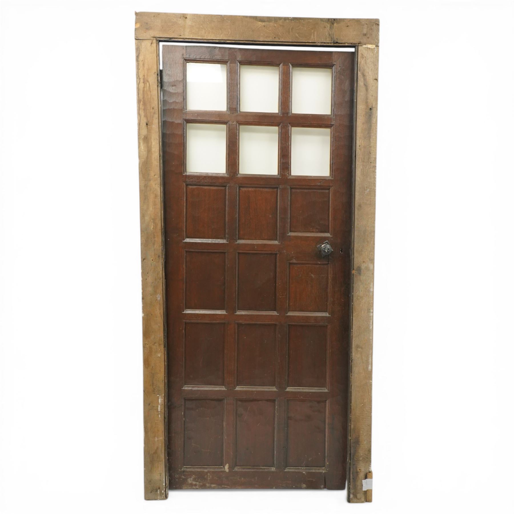 Mouseman - 1940s glazed, panelled and adzed vestibule door with castellated frame, with carved mouse signature, by Robert Thompson of Kilburn