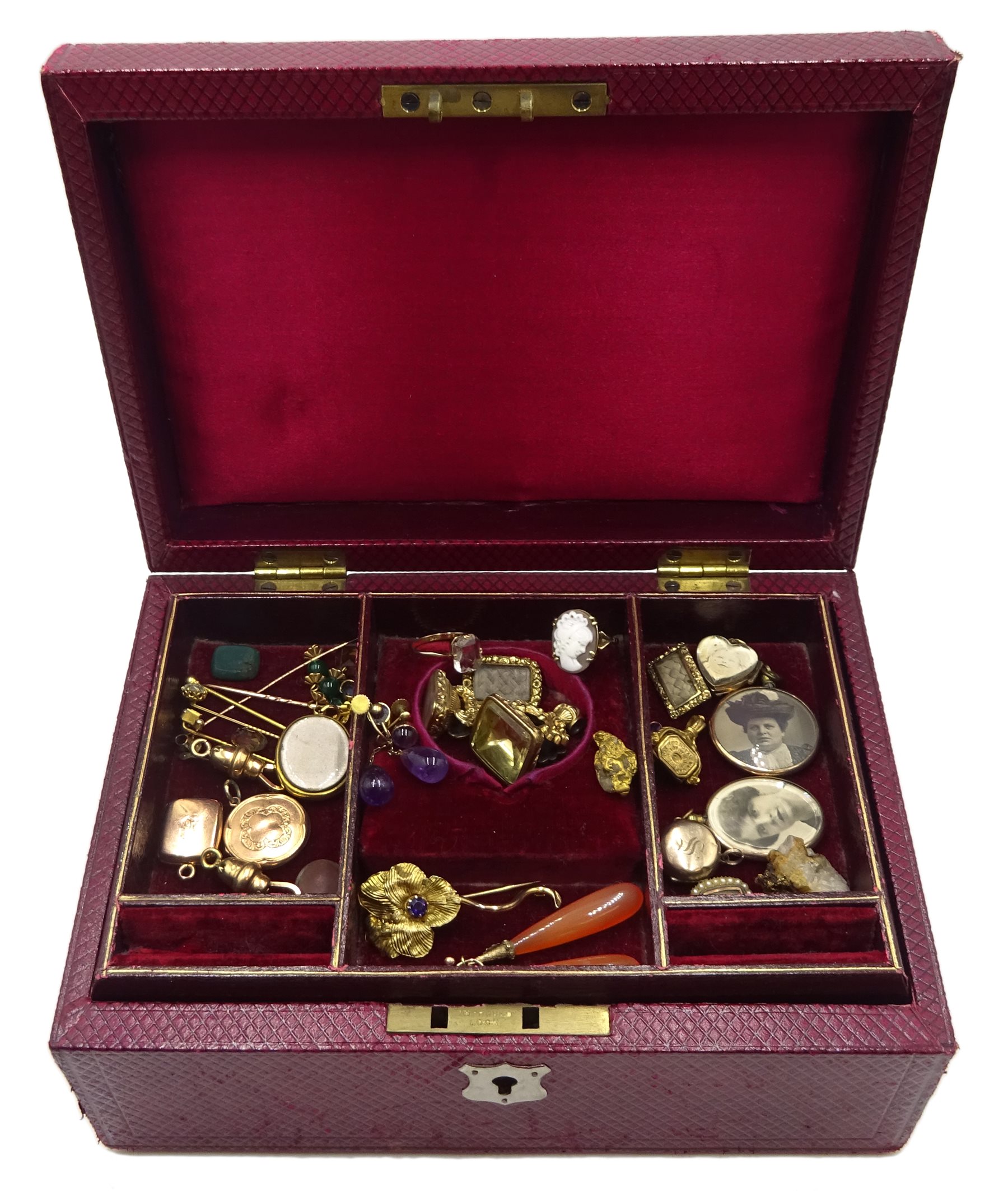 Early 20th century tooled leather jewellery box, velvet and silk lined