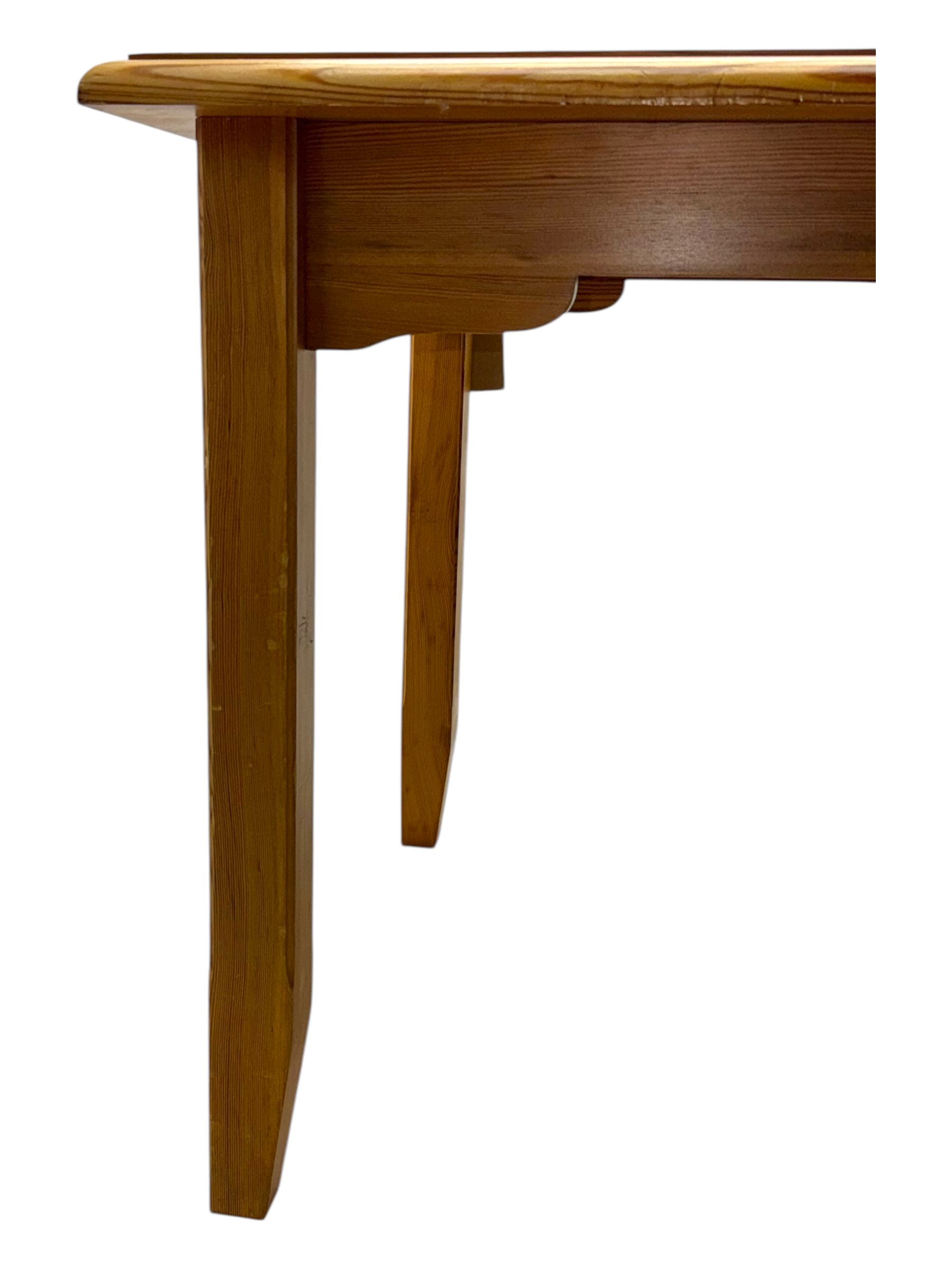 Laura Ashley - contemporary pine dining table, rectangular top with moulded edge, raised on square supports with chamfered lower sections