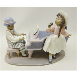  Lladro 'The Jazz Duo' no. 5930 large group figure depicting a young boy playing the piano with a young girl singing, L32cm  