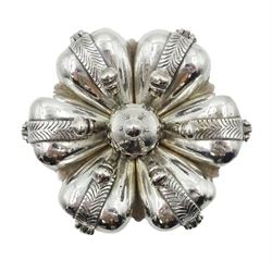 Indian silver spice box/pandan, probably 19th century, modelled in the form of a stylised flower with six lobed divisions with hinged covers, secured by a central screw threaded rod with baluster finial, upon six legs with flower pad feet, H9cm, approximate gross weight 23.79 ozt (740 grams)