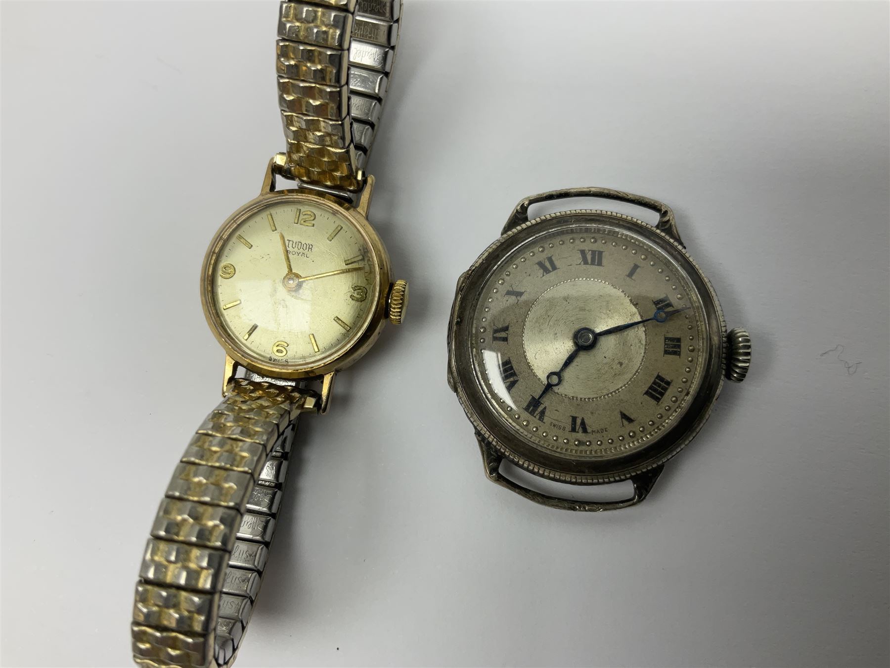 Tudor Royal 9ct gold ladies wristwatch, on expanding gilt bracelet, Gillex silver wristwatch, on silver bracelet, two early 20th century silver wristwatches and one other gilt wristwatch, all manual wind movements