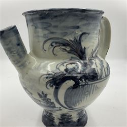 Tin glazed earthenware wet drug jug, decorated with cherubs in a landscape, H90cm 