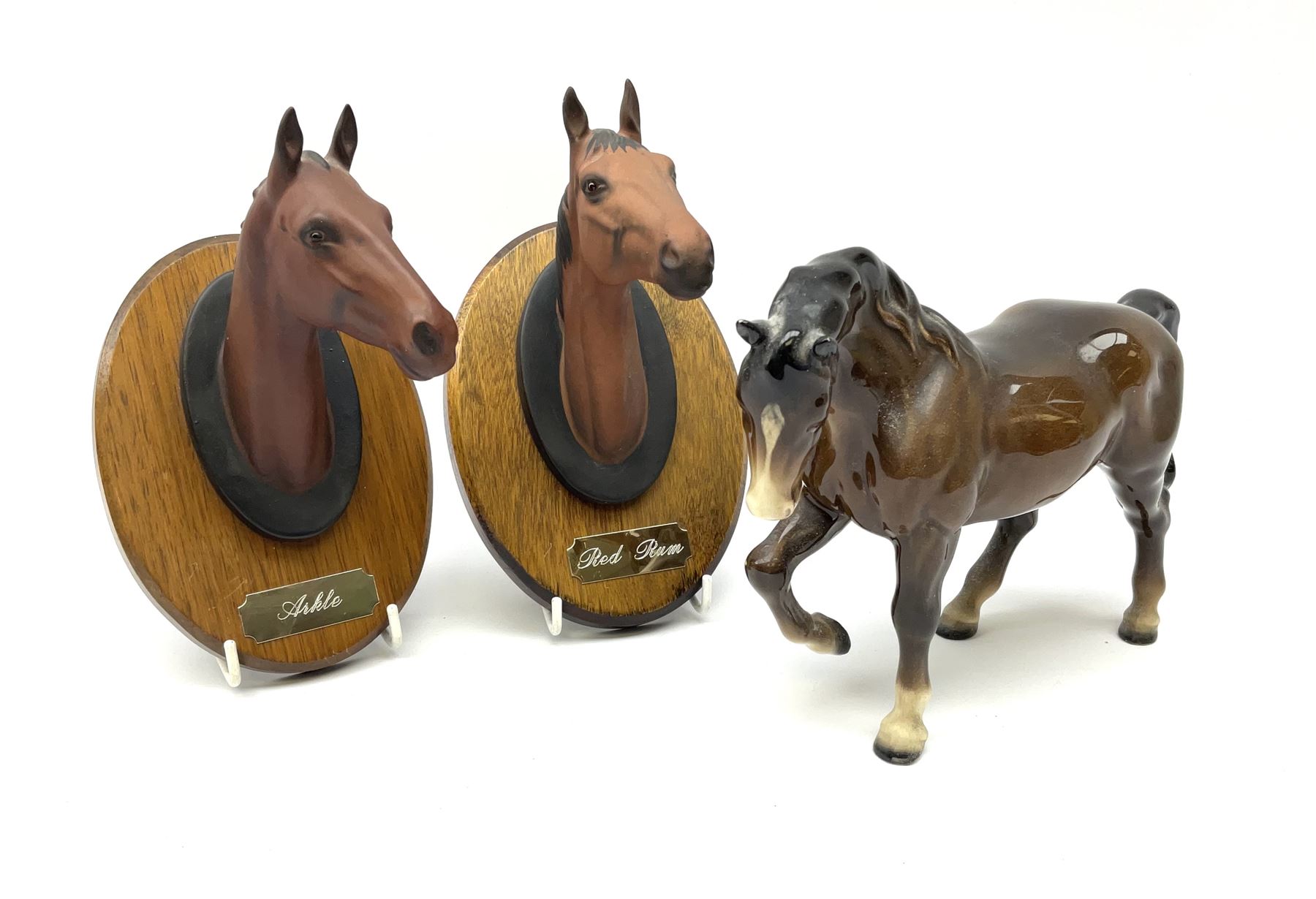 Two Beswick horse and 'Champions All' Wall Plaques, Arkle and Red Rum.