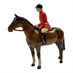 Beswick hunting group, comprising huntsman on bay horse no. 1501, fox figure no. 1440 , and four fox hounds, all with printed marks beneath (6)