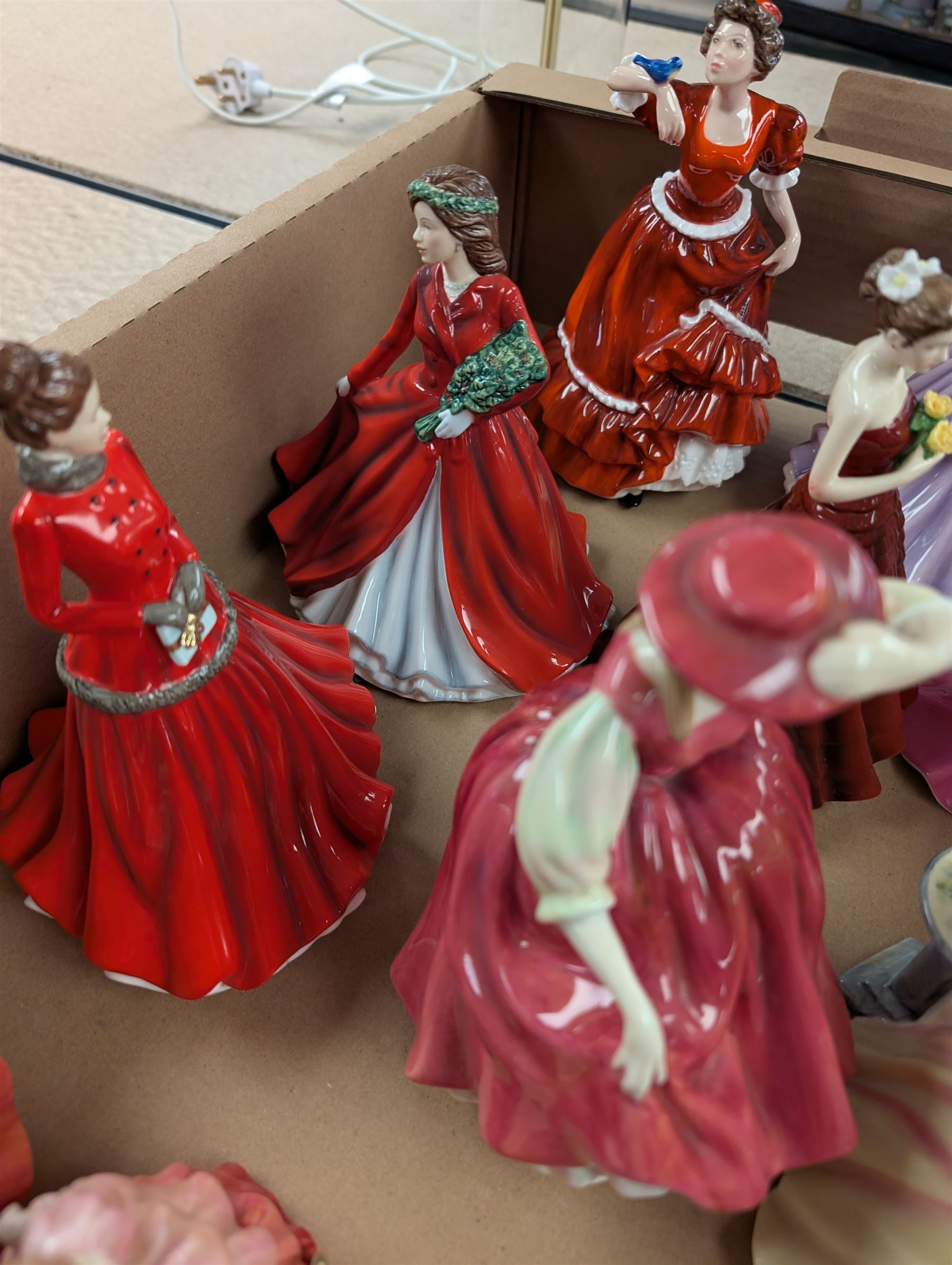Eighteen Royal Doulton figures including Victoria, Pauline, Alexandra and Charlotte