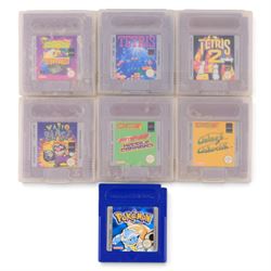 Nintendo Gameboy handheld game console in black, boxed, with seven games comprising Pokemon Blue, Arcade Classic 3: Galaga and Galaxian, Tetris, Tetris 2, Wario Blast, Arcade Classics Super Breakout Battlezone and Arcade Classics 1 Asteroids and Missile Command, all unboxed