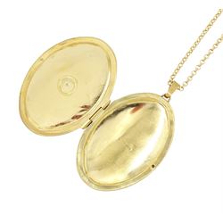 9ct gold hinged locket pendant necklace, with engraved decoration and set with a single diamond chip, hallmarked
