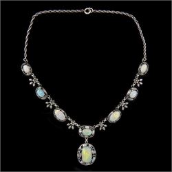 Arts & Crafts silver opal necklace in the manner of Rhoda Wager, set with eight oval cut o...