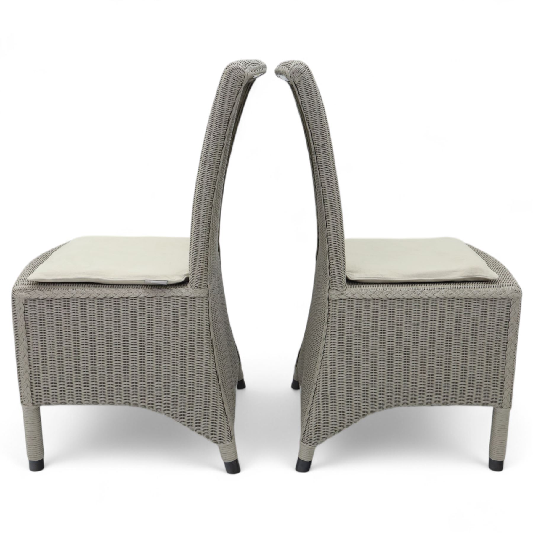 Neptune – Sheldrake limed oak extendable dining table and eight Havan loom chairs, the oval top in limed oak finish with four additional leaves extending the table to seat up to ten (Extends to cm), raised on turned legs with two additional centre supports, the matching Havan loom chairs finished in grey with cream upholstered seat covers (H 95cm, W 47cm, D 55cm)