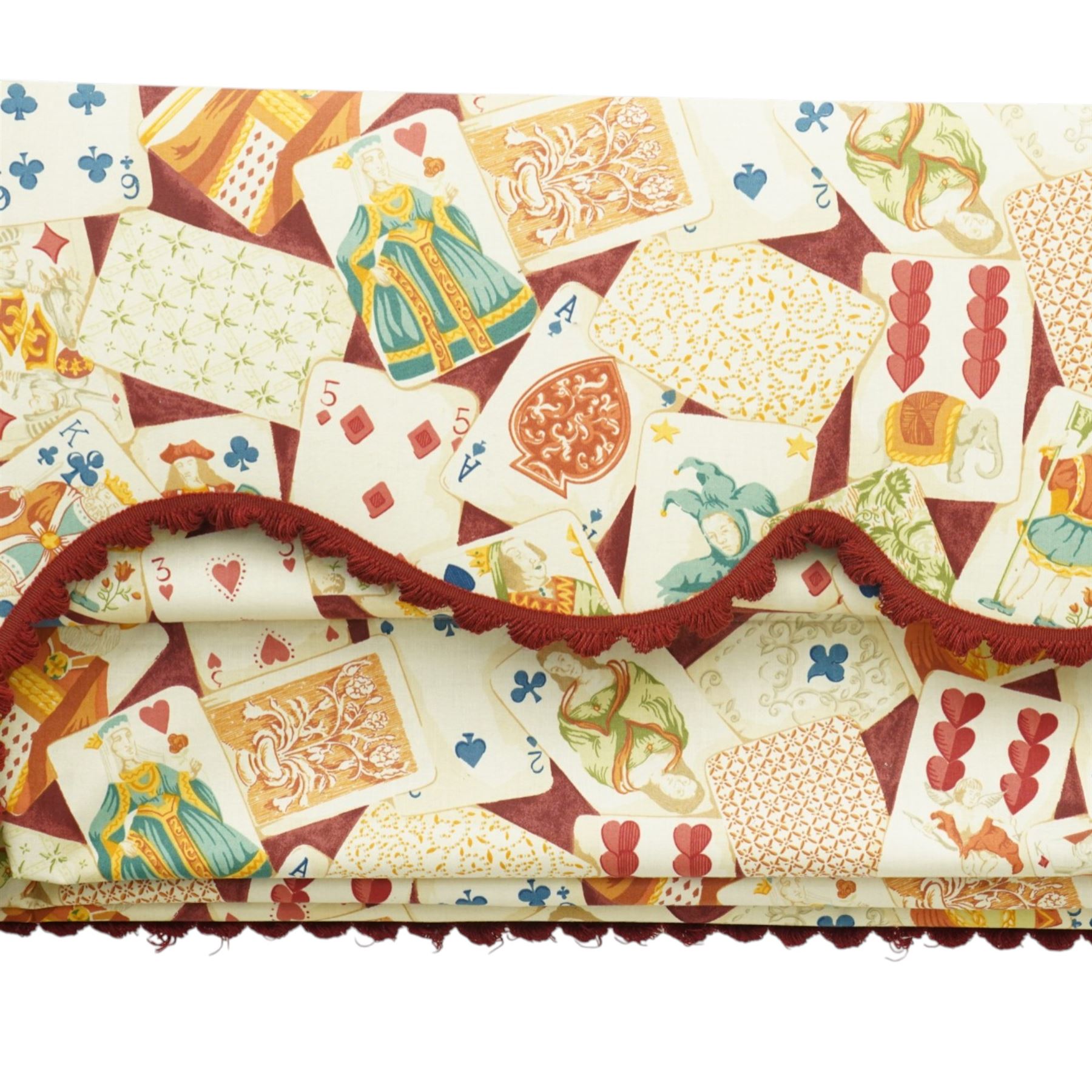 Late 20th century upholstered window pelmet with internal blind and side drapes, covered in a playing card patterned fabric with scalloped edging and red braid trim