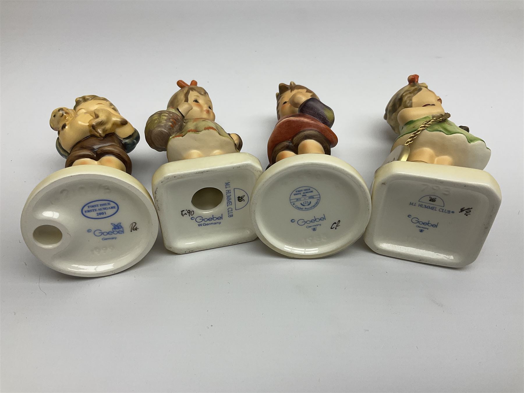 Twenty five Hummel figures by Goebel, to include Tuning up, Blessed Event, Book Worm, The Little Architect etc 