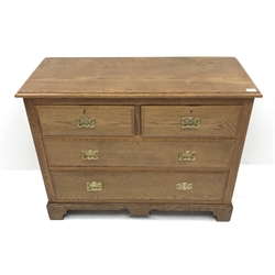 Edwardian oak chest, moulded top, two short and two long drawers, shaped plinth base, W107cm, H82cm, D46cm