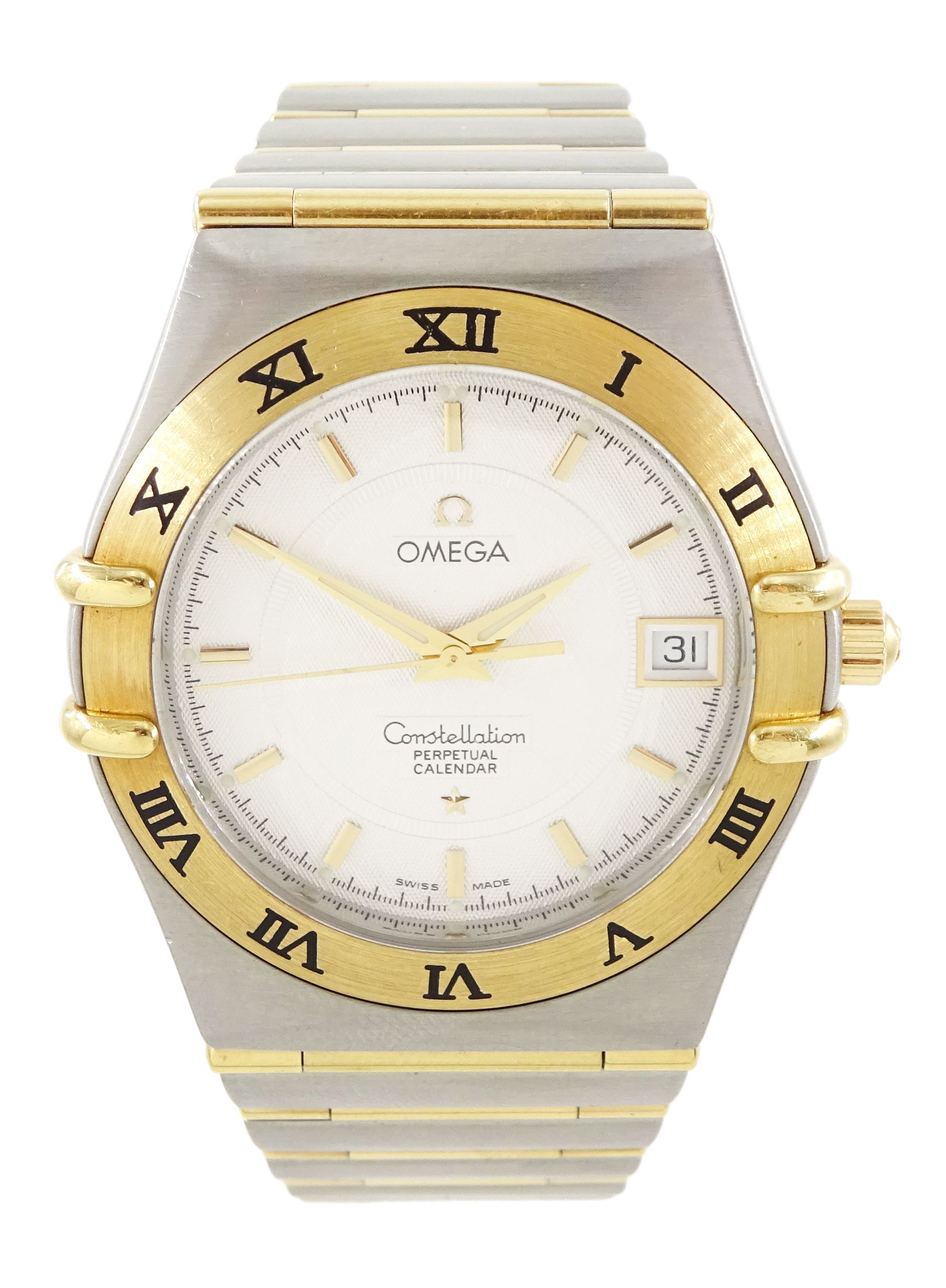 Omega Constellation gentleman's gold and stainless steel quartz wristwatch, Cal. 1680, Ref. 1252.30.00, silvered dial with baton hour markers,  on integral gold and stainless steel bracelet, with fold-over clasp, with warranty card dated 2004