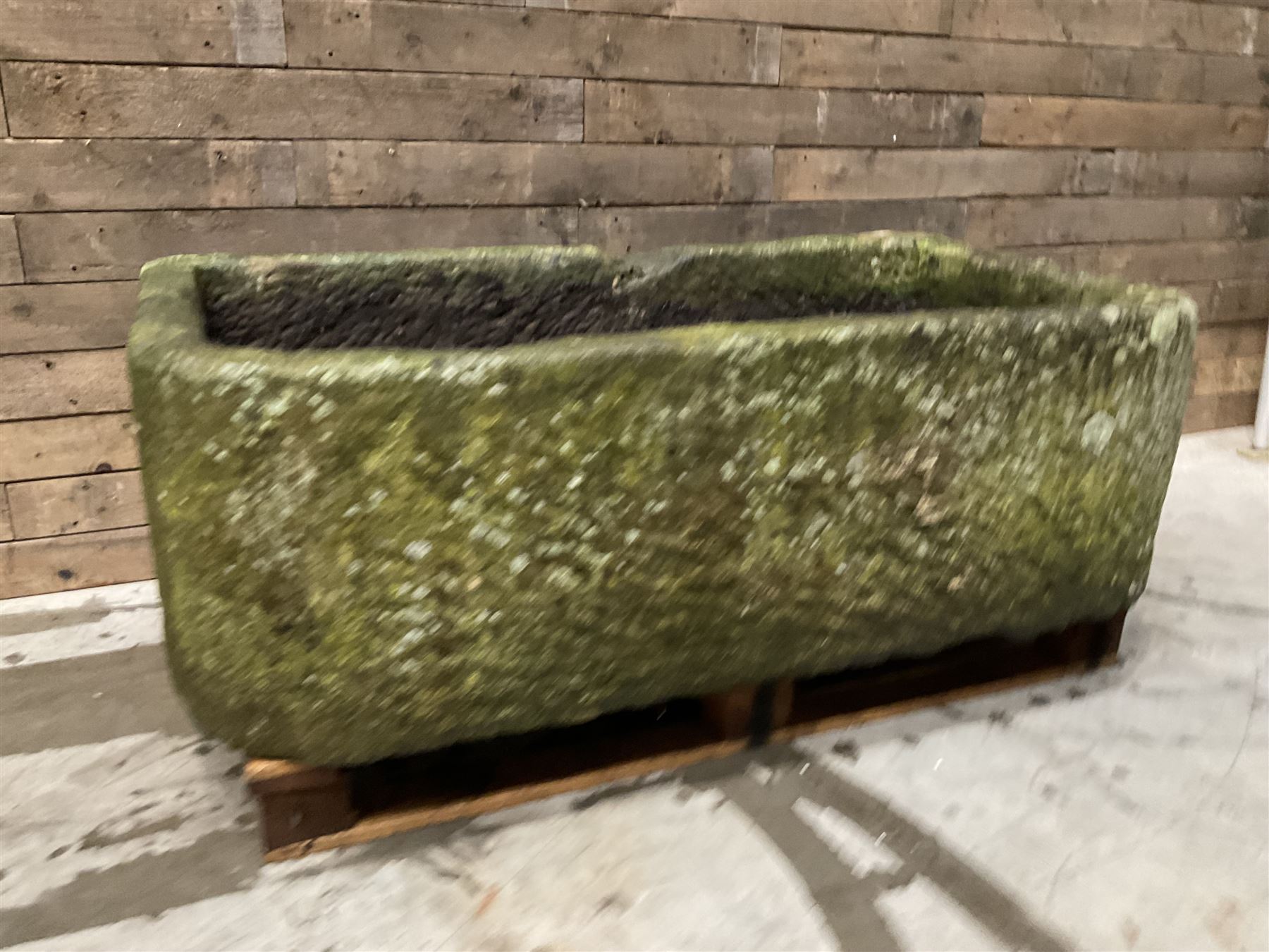 Large 19th century D shaped stone trough