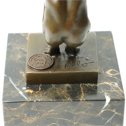 Bronze figure 'Power Of Silence', modelled as a male athlete crouched with arms outstretched, signed Milo, on black marble plinth, H15cm