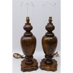  Pair carved oak of table lamps of knopped baluster form on shaped base, H45cm   